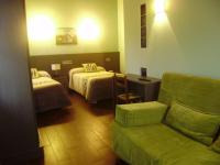 Posteľ alebo postele v izbe v ubytovaní Hotel Rural Las Palmeras Muskiz
