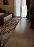 A bed or beds in a room at My Liva Hotel