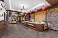Un restaurante u otro lugar para comer en Xingshengjiu Courtyard Hotel Pingyao