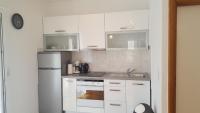 Kuchyň nebo kuchyňský kout v ubytování Apartments Karlo