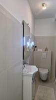 Ein Badezimmer in der Unterkunft Basic Mansion Mandalina