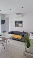 Ein Sitzbereich in der Unterkunft Basic Mansion Mandalina
