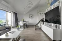 TV&#47;Unterhaltungsangebot in der Unterkunft Waterlane Riverside - SPA, Pool, Gym &amp; Parking by Downtown Apartments