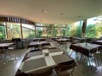 En restaurant eller et andet spisested på Hotel Fazenda Tucano