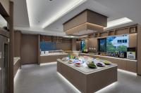 Una cocina grande con una mesa con platos de comida. en All-weather Hotel Wutian Old Street Branch, en Wenzhou