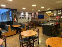 Un lugar para sentarse en eSuites Sorocaba