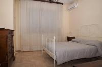 Posteľ alebo postele v izbe v ubytovaní B&B La Bougainvillea