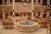 Un restaurante u otro lugar para comer en TASHAN1699 Otel ve Restoran