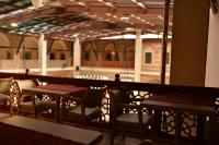 Un restaurante u otro lugar para comer en TASHAN1699 Otel ve Restoran