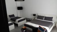 A bed or beds in a room at B&B Roda Barocco