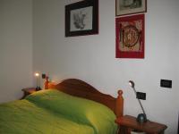 A bed or beds in a room at Agriturismo La Vigna