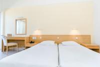 Posteľ alebo postele v izbe v ubytovaní Hotel Riviera