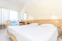 Posteľ alebo postele v izbe v ubytovaní Hotel Riviera