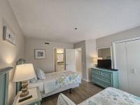 Ein Bett oder Betten in einem Zimmer der Unterkunft Serene 2 bed, 2 bath lodge, with amenities, 101AC lodge