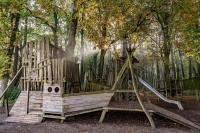 Ein Garten an der Unterkunft Ferienpark Rübezahl am Müggelsee, Haus 21 Efeu mit eigener Sauna, idealer Ort für Natur- und Erholungssuchende, für Radfahrer, Familien mit Kindern und Hundeliebhaber