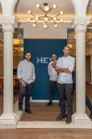 three men standing in a room with columns at Splendide Riviera Boutique Art Hotel in Rapallo