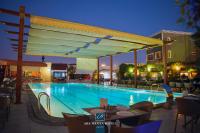 Πισίνα στο ή κοντά στο Abu Sanaa Hotel