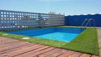 Bazén v ubytovaní Homely Málaga Carretería con piscina alebo v jeho blízkosti