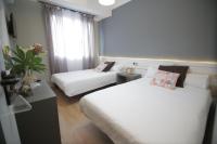 Postel nebo postele na pokoji v ubytování Hotel Alda Estación Vigo