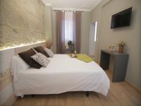 Postel nebo postele na pokoji v ubytování Hotel Alda Estación Vigo