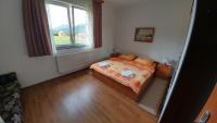 Posteľ alebo postele v izbe v ubytovaní Guest House Mijić