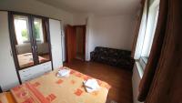 Posteľ alebo postele v izbe v ubytovaní Guest House Mijić