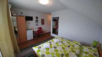 Posteľ alebo postele v izbe v ubytovaní Guest House Mijić