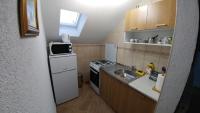 Kuchyňa alebo kuchynka v ubytovaní Guest House Mijić