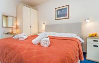 Posteľ alebo postele v izbe v ubytovaní Hotel Dubrovnik