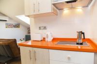 Kuchyňa alebo kuchynka v ubytovaní Apartamentos Momas La Casa De Mamá