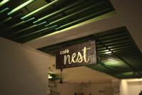 a cafe nest sign hanging from the ceiling of a room at Grihum Living Girls - FEMALE ONLY in Rānchī