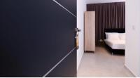 Ein Bett oder Betten in einem Zimmer der Unterkunft Sun Sea Center