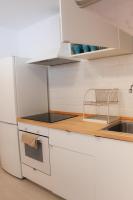 Kuchyň nebo kuchyňský kout v ubytování Apartment Sky Cervantes