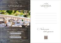 Un menú para un restaurante con una mesa con comida. en Hotel La Plantación, en Finestrat