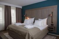 Ένα ή περισσότερα κρεβάτια σε δωμάτιο στο Quality Hotel Grand Falun