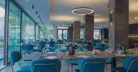 En restaurant eller et andet spisested på Hotel Leonardo Da Vinci Wellness SPA