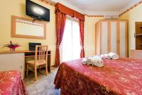 Posteľ alebo postele v izbe v ubytovaní Hotel Marco Polo