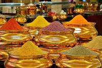 a group of glass bowls filled with different colored spices at Marriott Hotel Jabal Omar Makkah in Makkah