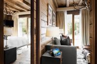 Televízia a/alebo spoločenská miestnosť v ubytovaní El Lodge, Ski & Spa