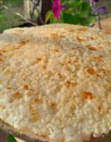 a close up of a rice cake on a plate at Hospedaje Los Buenos Aires in Santa Ana