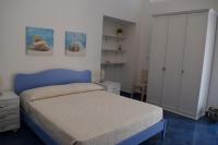 Posteľ alebo postele v izbe v ubytovaní La Casa di Cirro