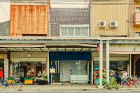 a group of buildings on a city street at まちの別邸 緝 shu in Kochi