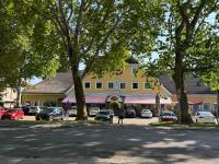 a group of people walking in front of a building at Studio Apartment Graz Schloss Eggenberg in Graz