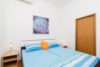Posteľ alebo postele v izbe v ubytovaní Apartments Mamma Mia