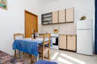 Kuchyňa alebo kuchynka v ubytovaní Apartments Mamma Mia