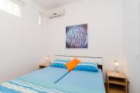 Posteľ alebo postele v izbe v ubytovaní Apartments Mamma Mia
