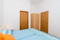 Posteľ alebo postele v izbe v ubytovaní Apartments Mamma Mia