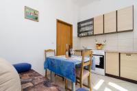Kuchyňa alebo kuchynka v ubytovaní Apartments Mamma Mia