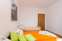Posteľ alebo postele v izbe v ubytovaní Apartments Mamma Mia