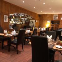 Un restaurante u otro lugar para comer en Belle Epoque Hotel Victoria & Apartments